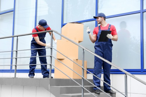 Staff member at Eastsheen Storage reviewing safety procedures in a secure facility