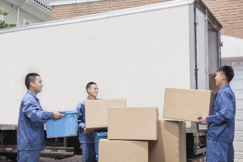 Packed boxes and furniture prepared for a local Eastsheen removal