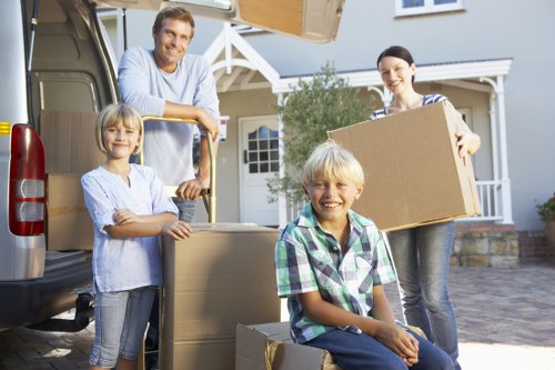 Professional movers handling furniture during an Eastsheen home relocation